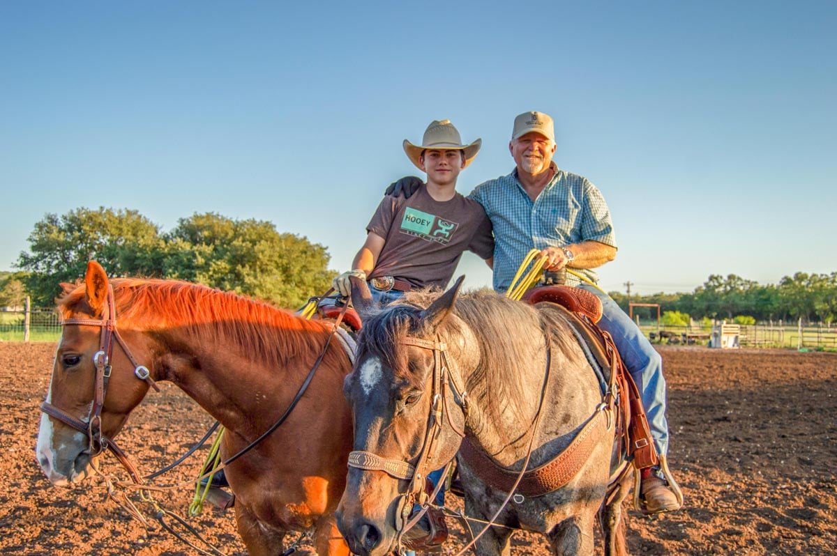 man-and-child-on-horseback
